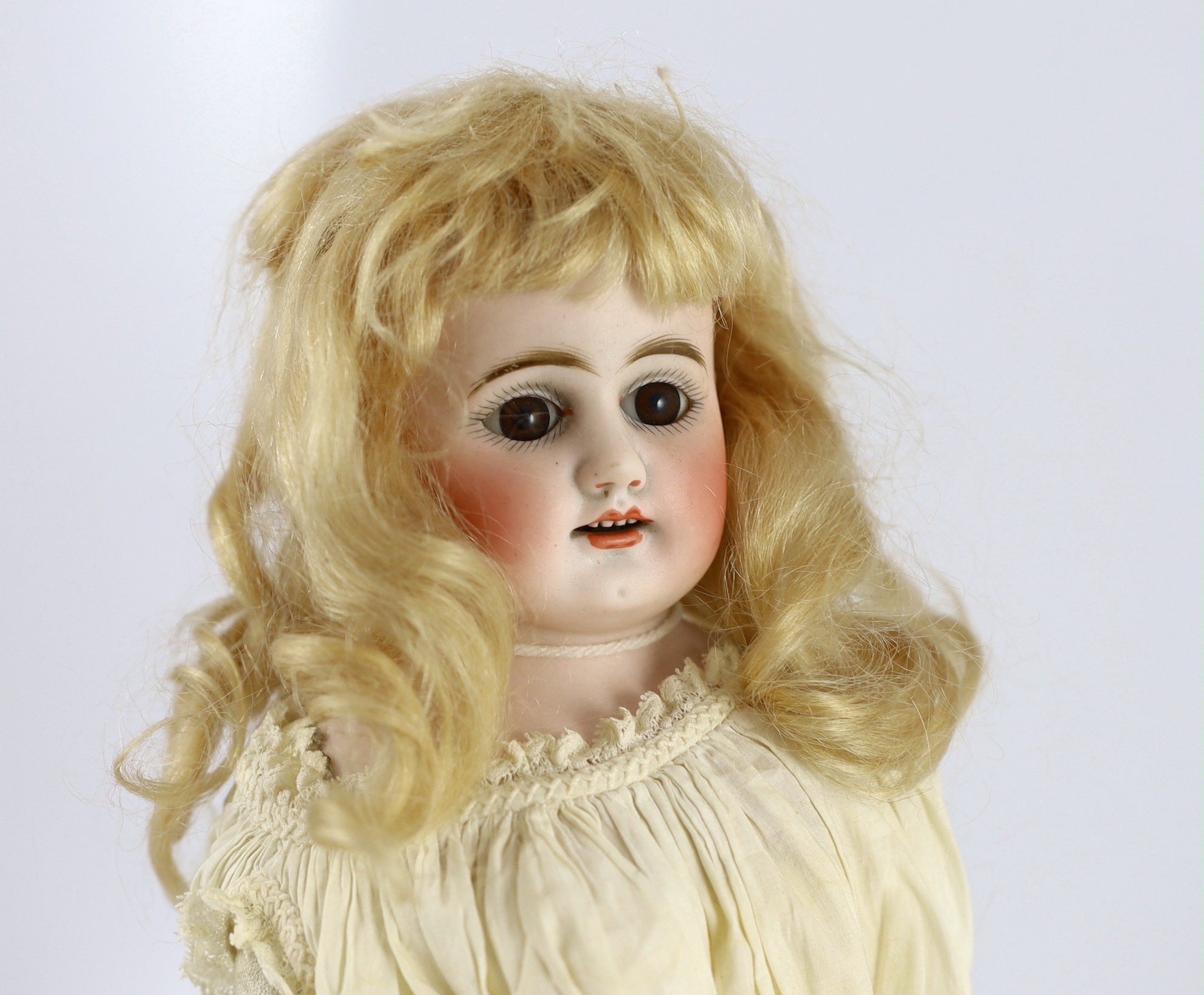 An Armand Marseille shoulder-bisque doll, German, circa 1896, 18in.